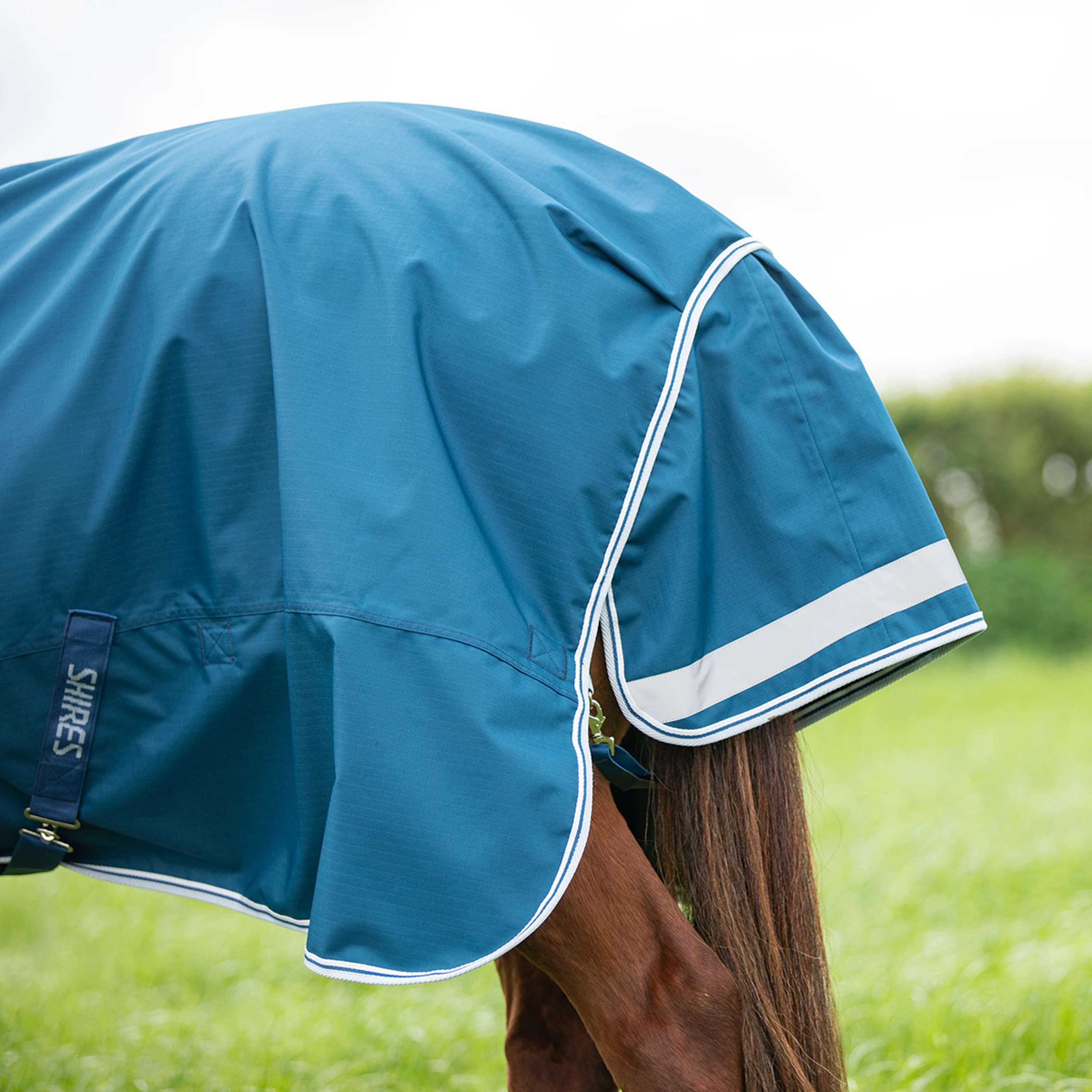 Shires Rain Rug Original 50 Turnout with a Hood Ocean