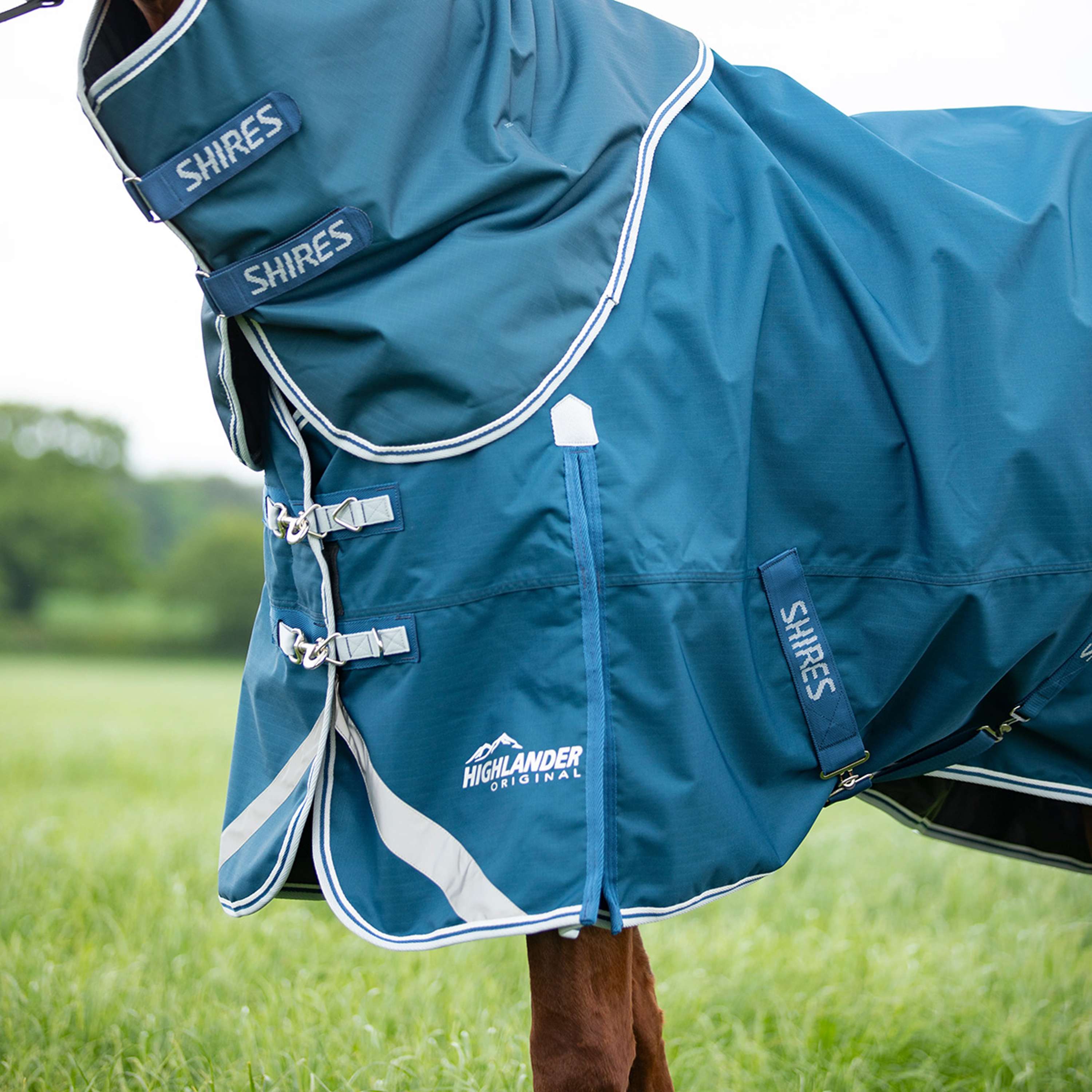 Shires Rain Rug Original 50 Turnout with a Hood Ocean